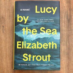 Lucy by the Sea Hardcover Book